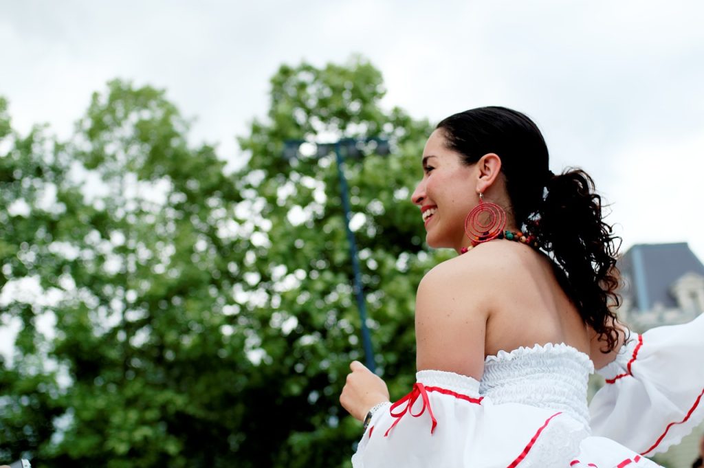 Latina girl wearing a typical dress from her region